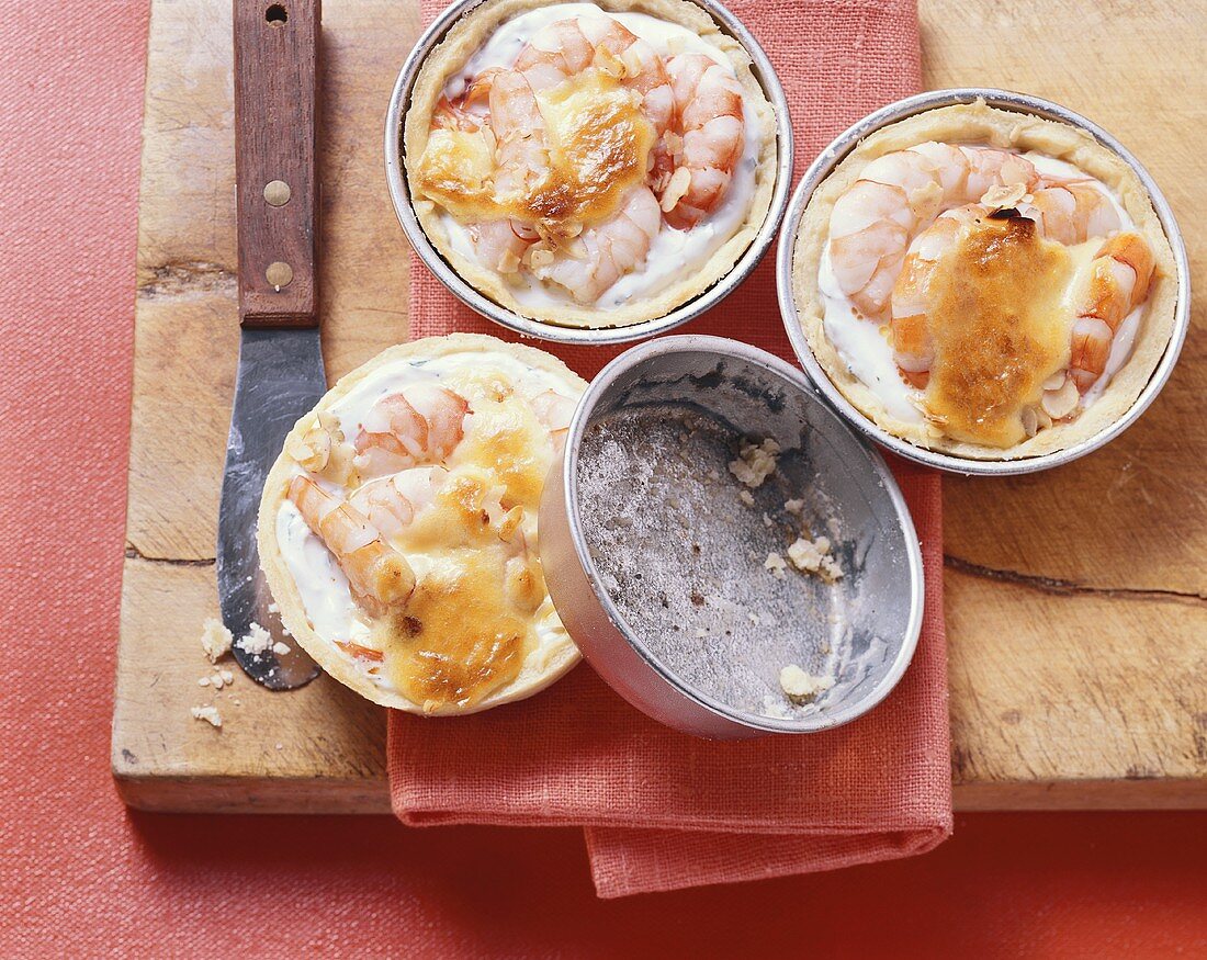 Shrimp tartlets with fresh goat’s cheese and thyme sabayon