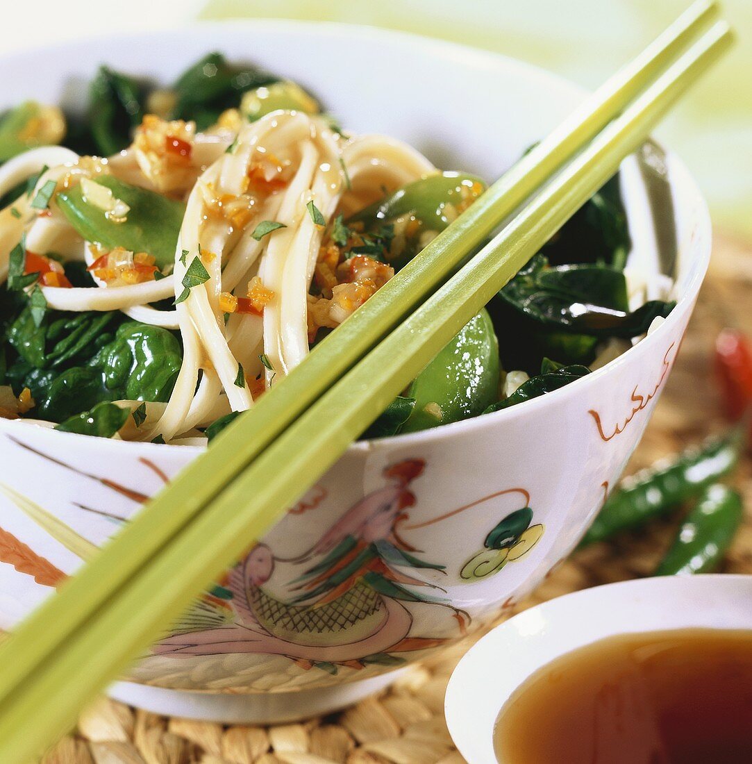 Rice noodles and spinach