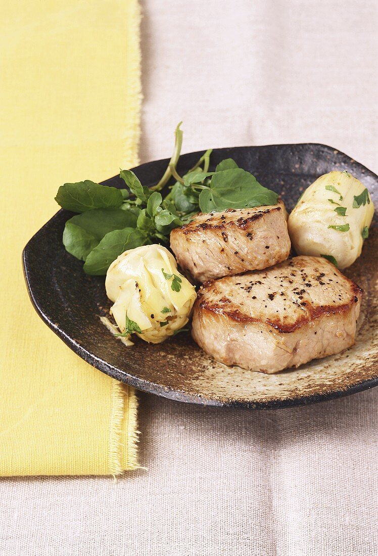 Veal medallions with artichokes