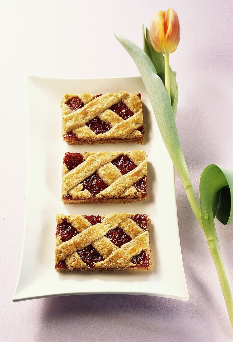 Three Linzer slices