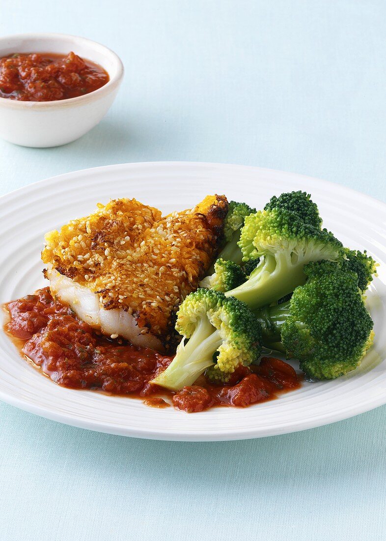 Cod fillet with sesame and carrot coating and broccoli