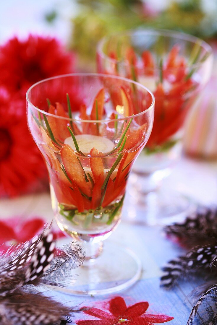 Red pepper, chives and quail's egg in jelly