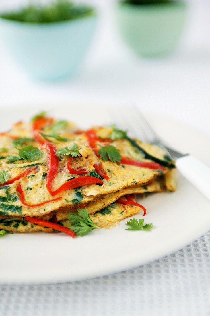 Omelette with peppers and parsley