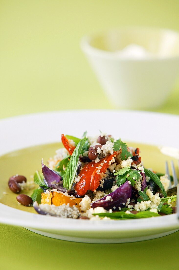 Couscous salad with vegetables and herbs