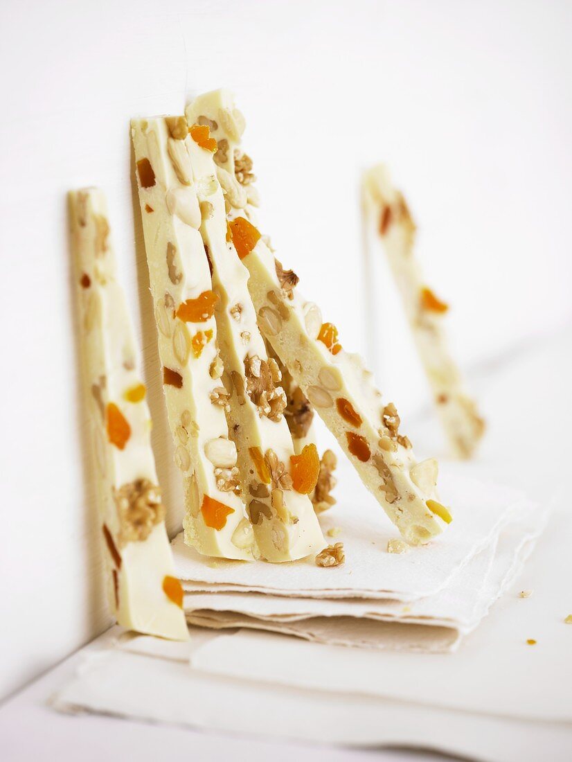 White chocolate sticks with nuts and dried fruit