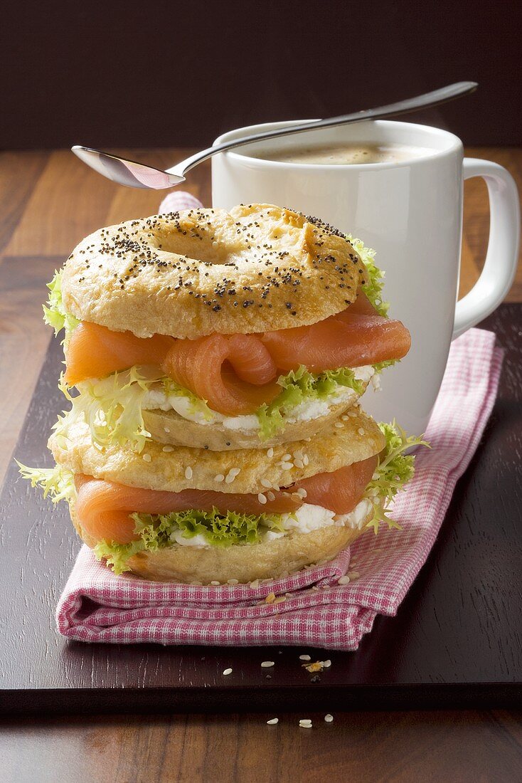 Poppy seed & sesame bagels filled with smoked salmon & cream cheese