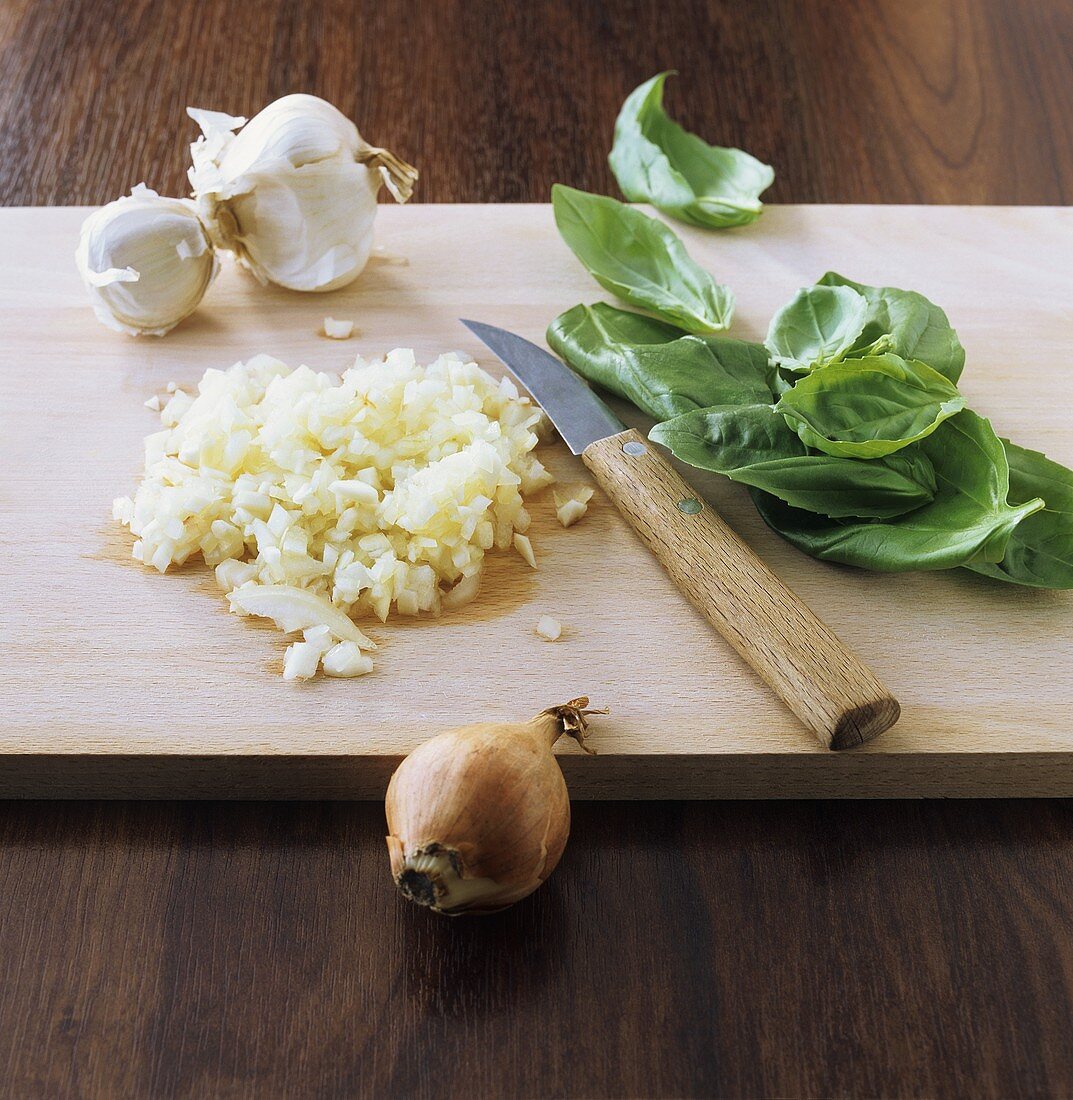 Onion and garlic, chopped, and fresh basil