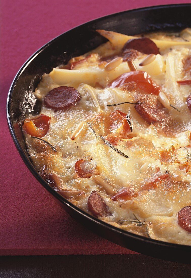 Potato bake with peppers and cabanossi