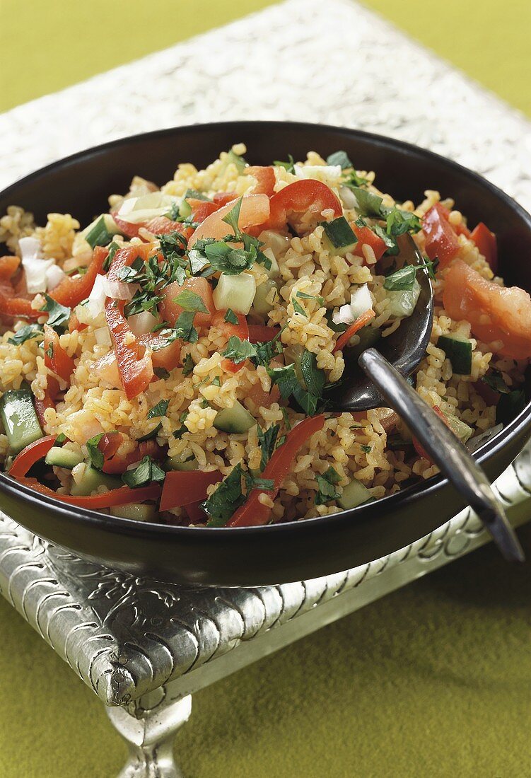 Bulgur wheat salad with tomatoes, peppers and cucumber