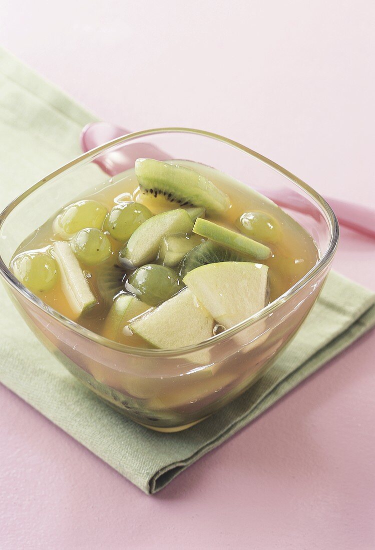 Green fruit compote with grapes, kiwi fruit and apples