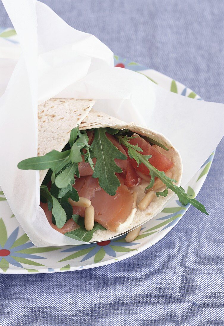 Wrap with rocket, smoked salmon and pine nuts