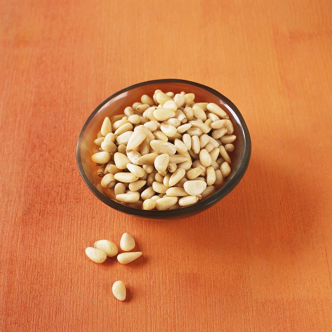 Pine nuts in small bowl