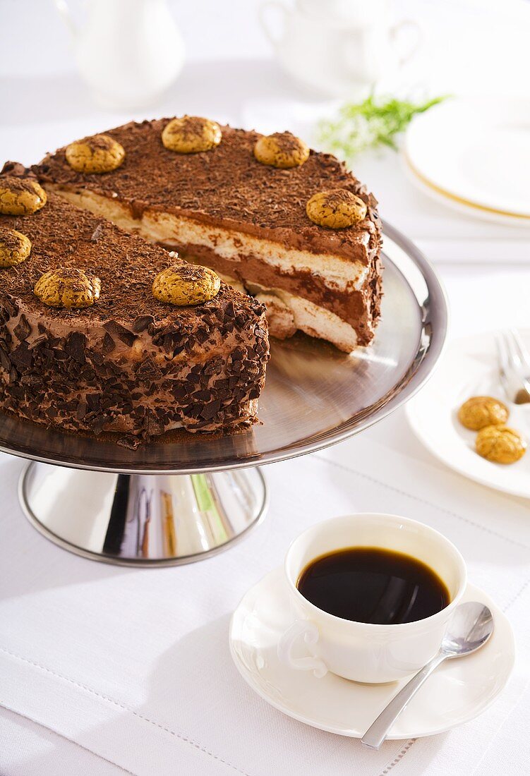 Coffee cake with amaretti, cup of coffee