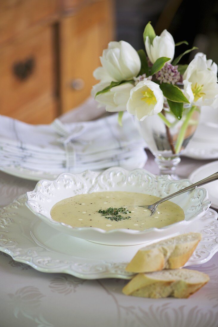 Camembert soup with baguette slices
