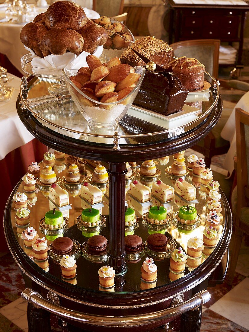 Assorted cakes and fancies on elegant tiered stand