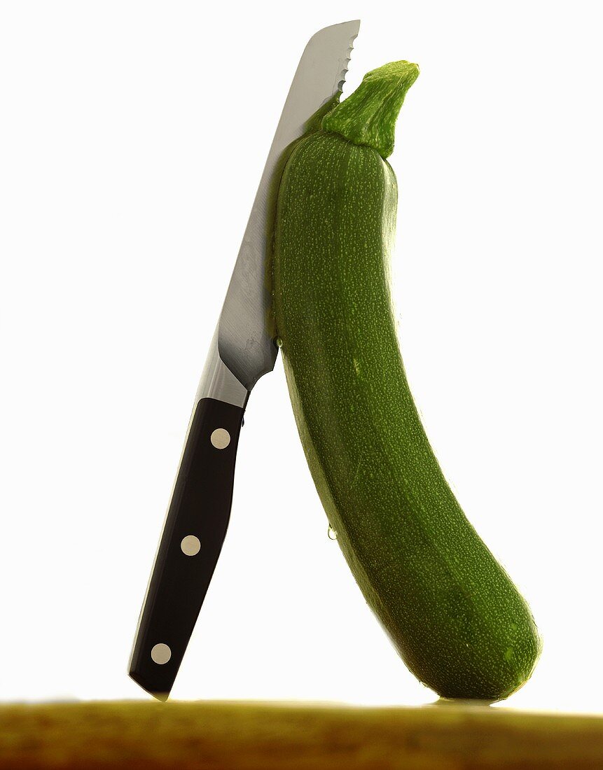 Courgette with knife