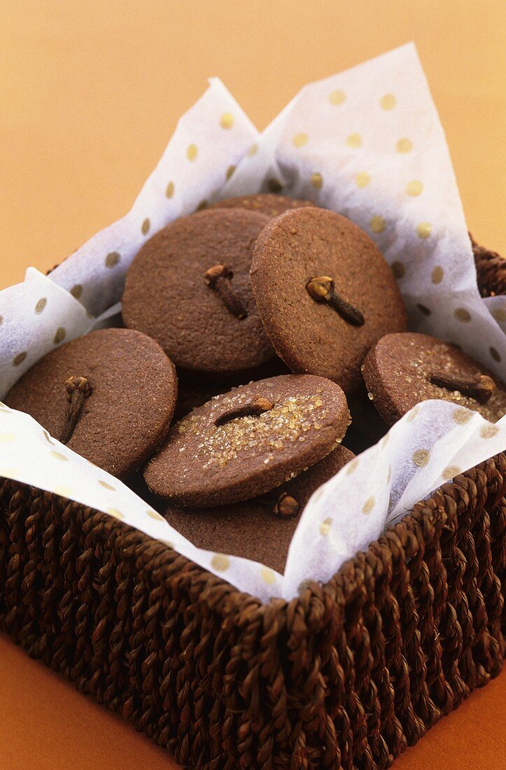 Chocolate biscuits with cloves in basket