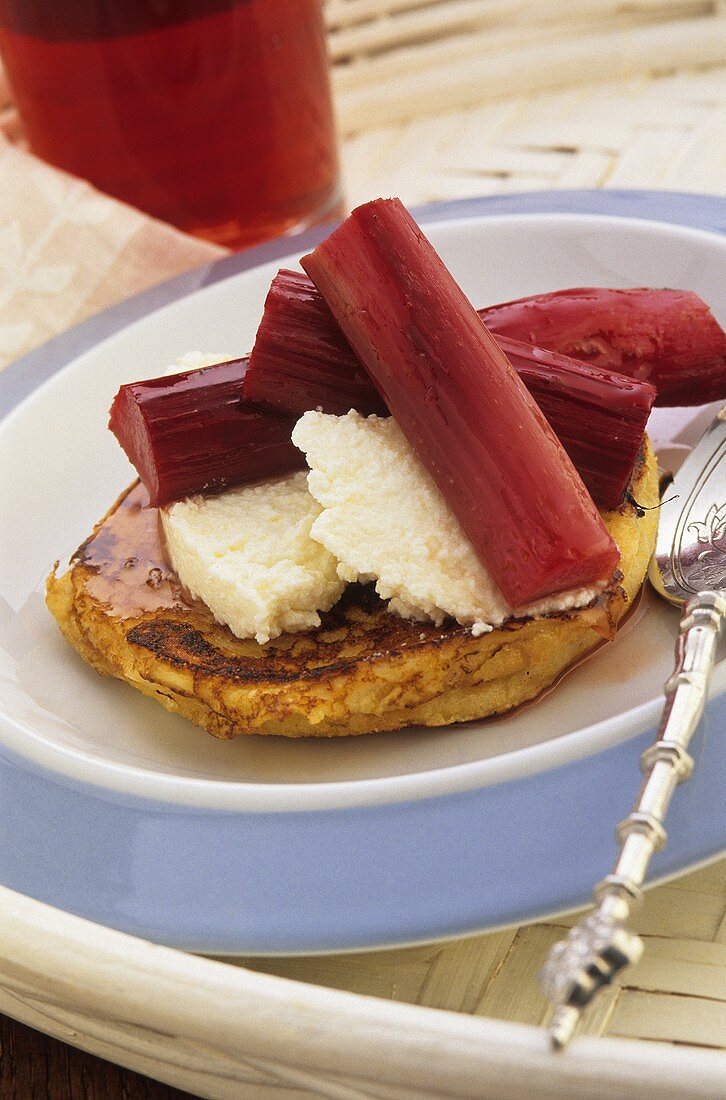 English muffin with rhubarb and maple syrup