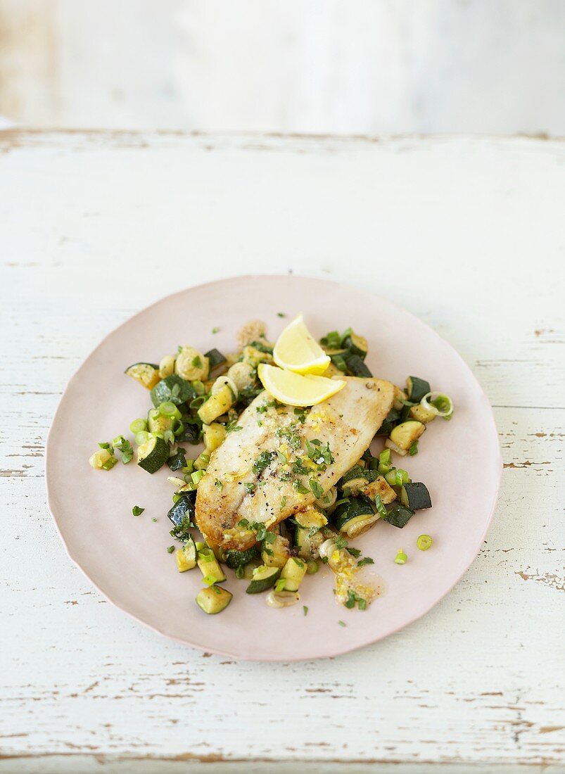 Fish with lemon and courgettes
