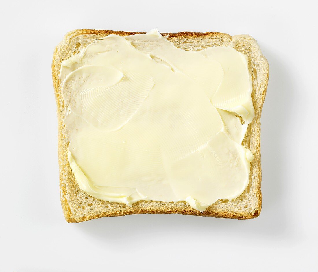 A slice of buttered bread