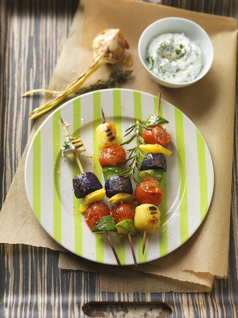 Mixed vegetable and potato kebabs with herb soft cheese