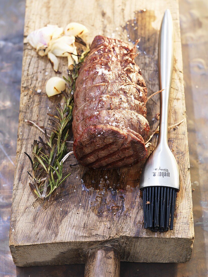 Barbecued beef fillet with rosemary and garlic