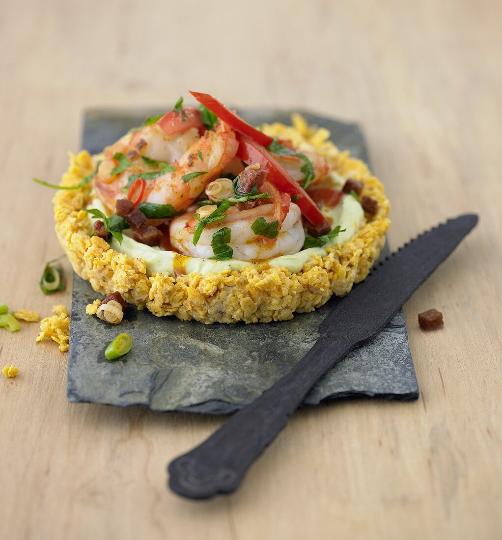 Avocado tart with chorizo prawns