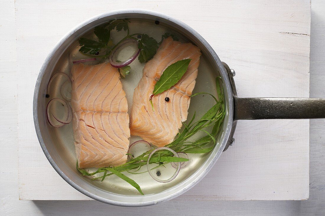 Poaching salmon fillets