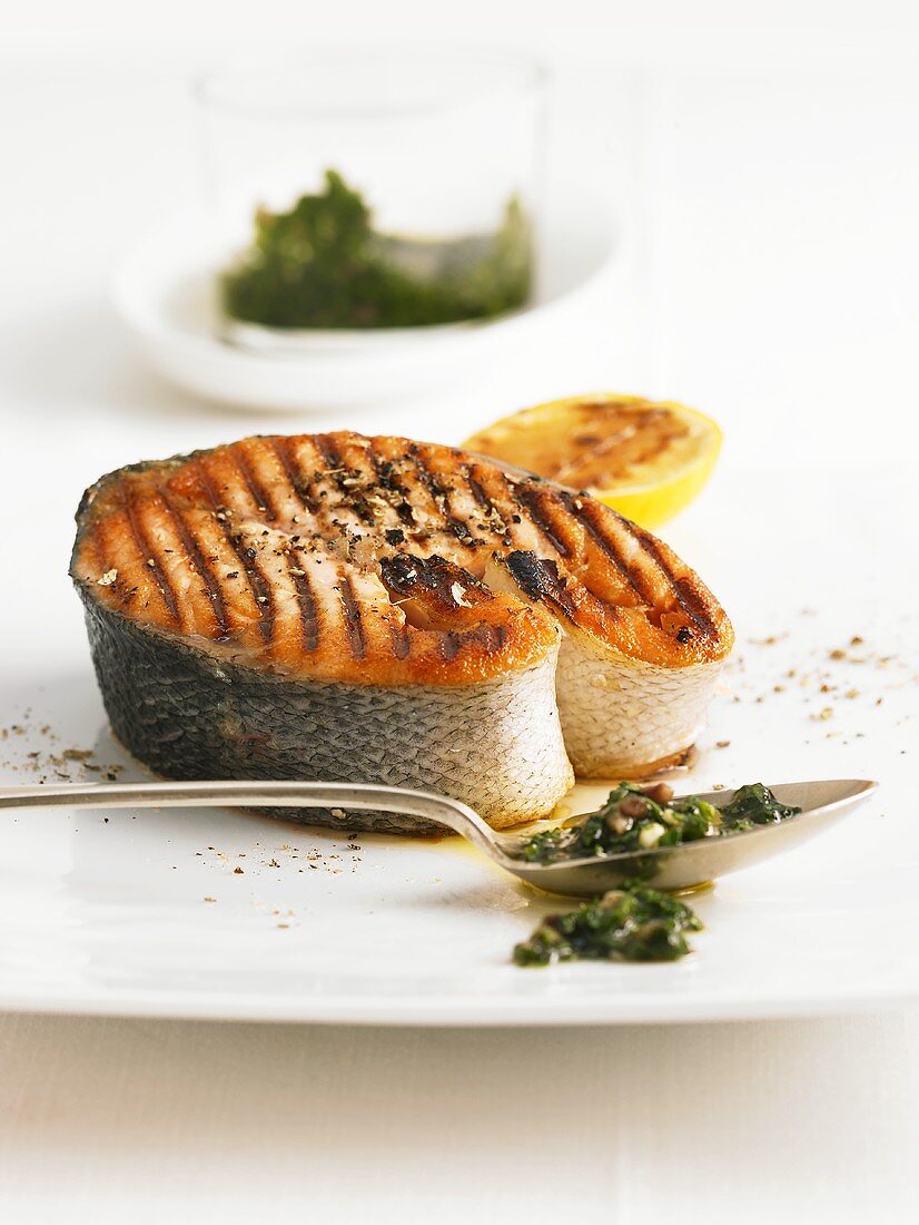 Barbecued salmon steak with pesto