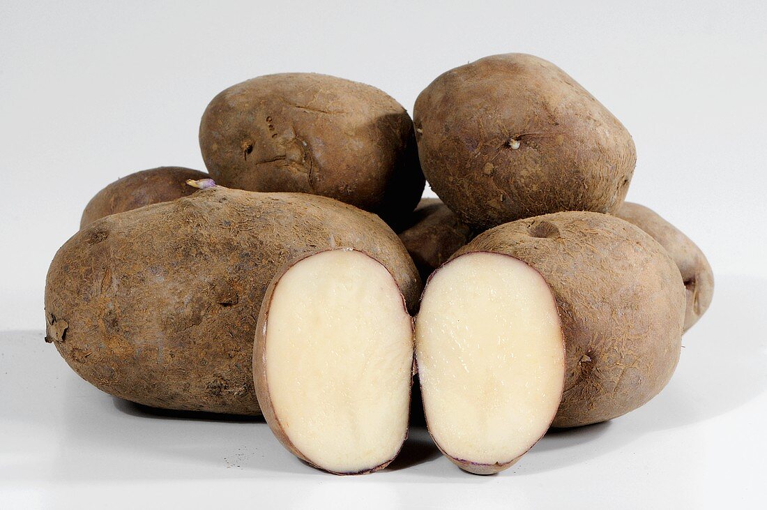 Potatoes (variety 'Edzell Blue'), whole and halved