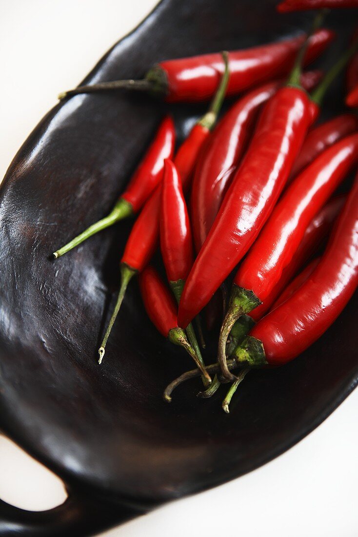 Red chillies in wooden bowl