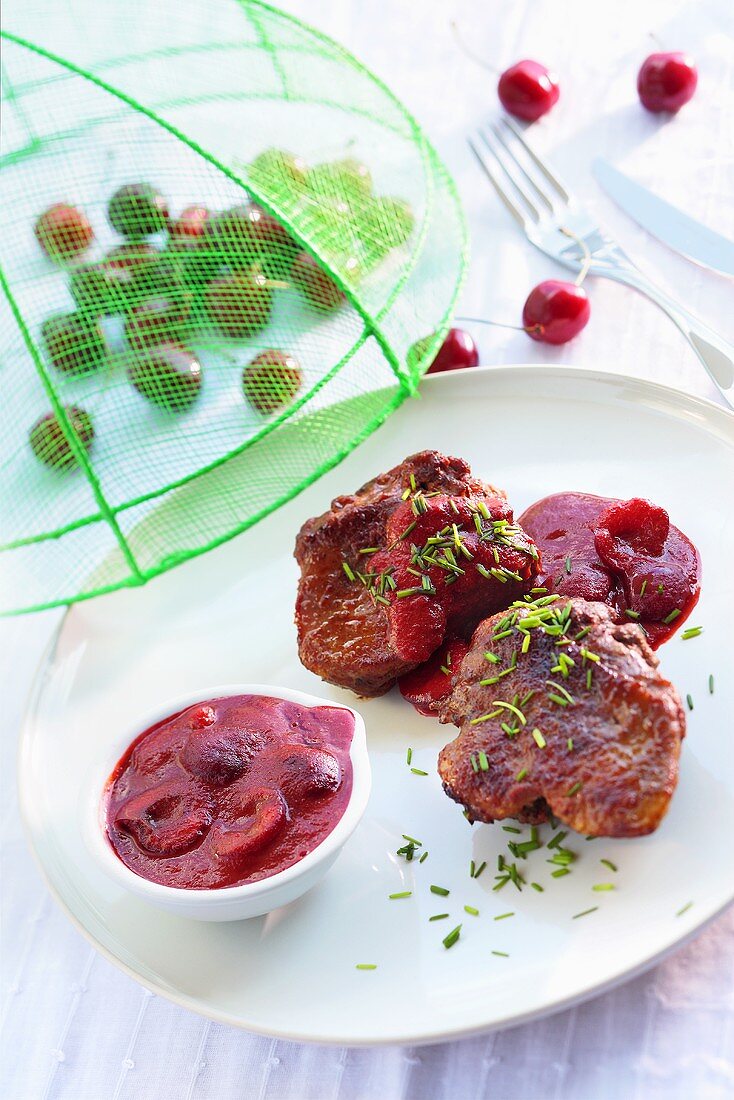 Meat with cherry sauce