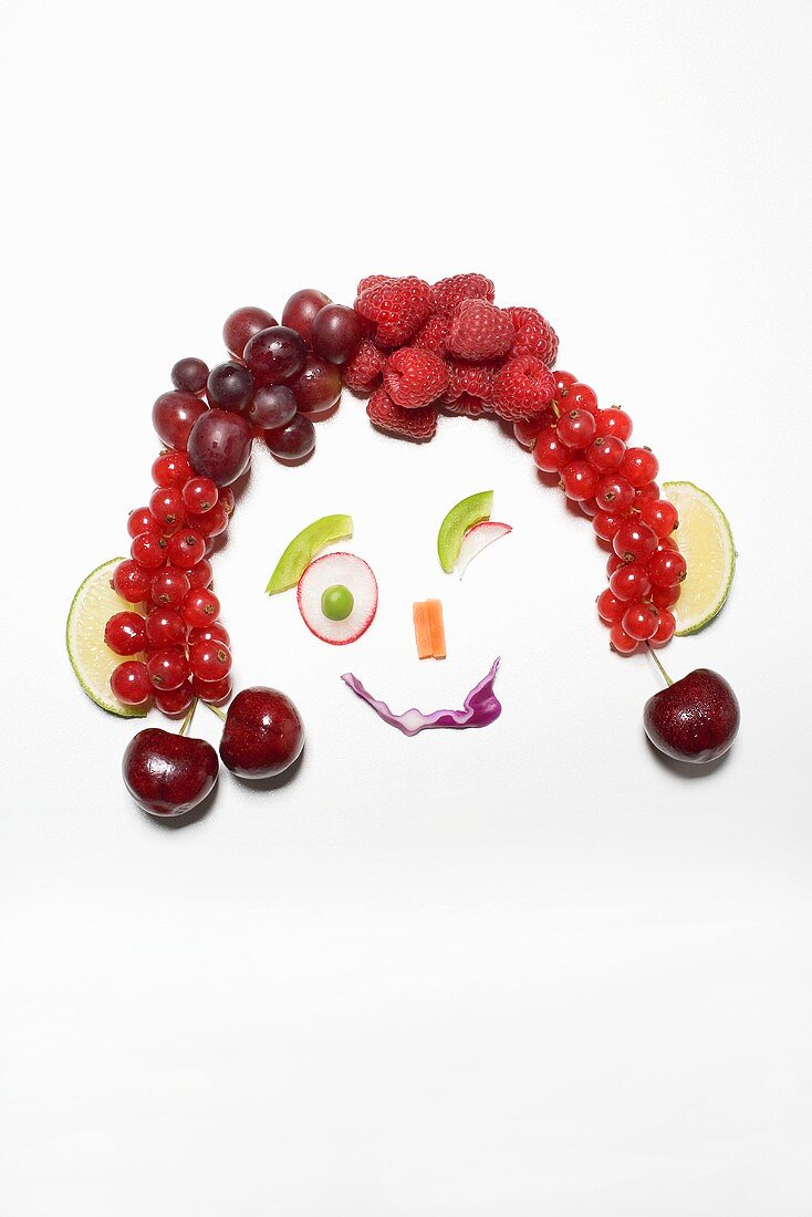 Gesicht aus Früchten und Gemüse