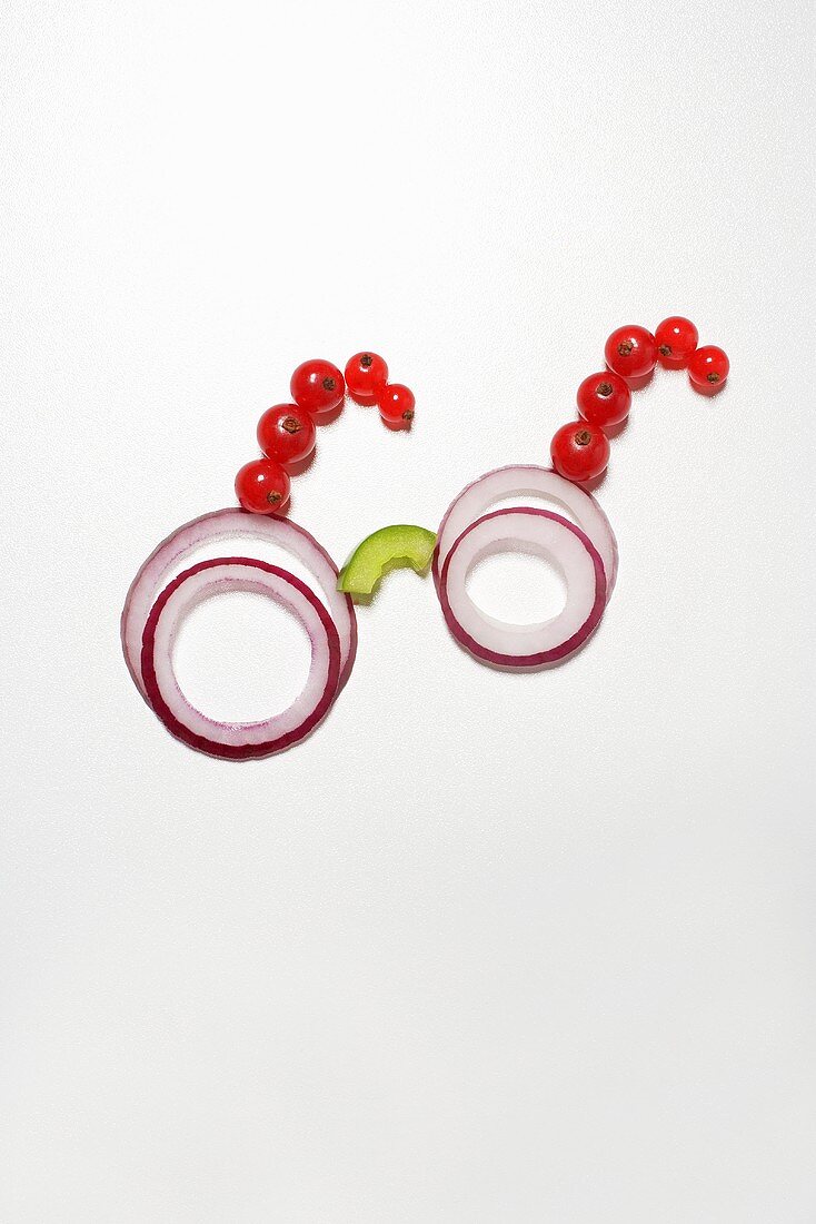 Spectacles made from onion rings and redcurrants