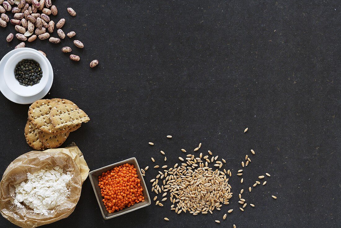 Still life with cereal, flour, pulses and crackers