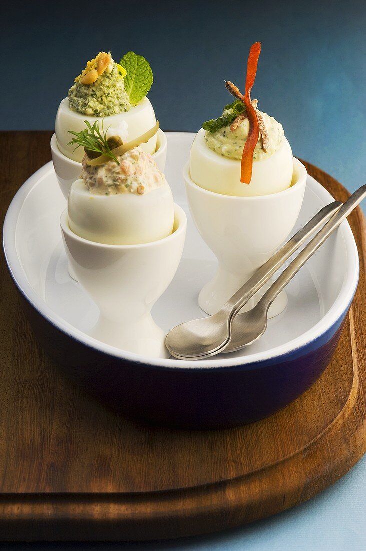 Stuffed eggs in egg cups