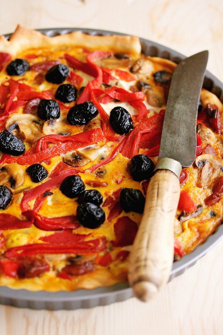 Red pepper quiche with olives