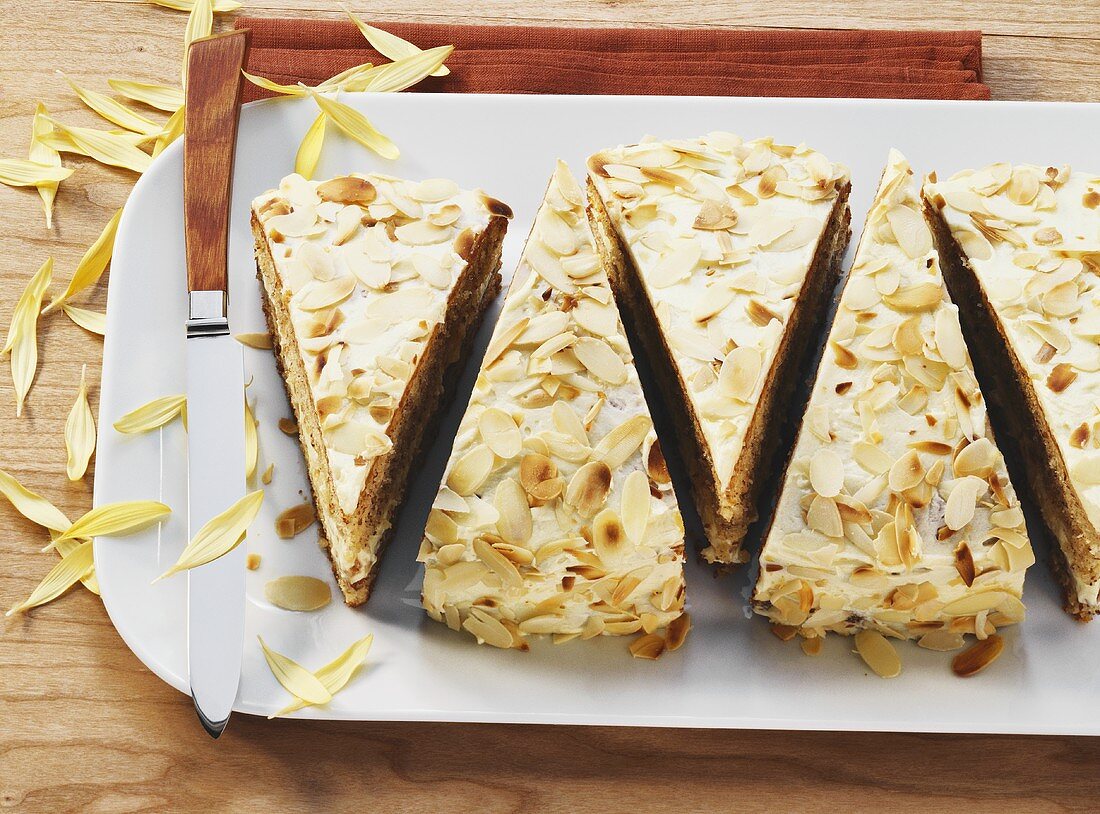 Almond cream cake, cut into pieces