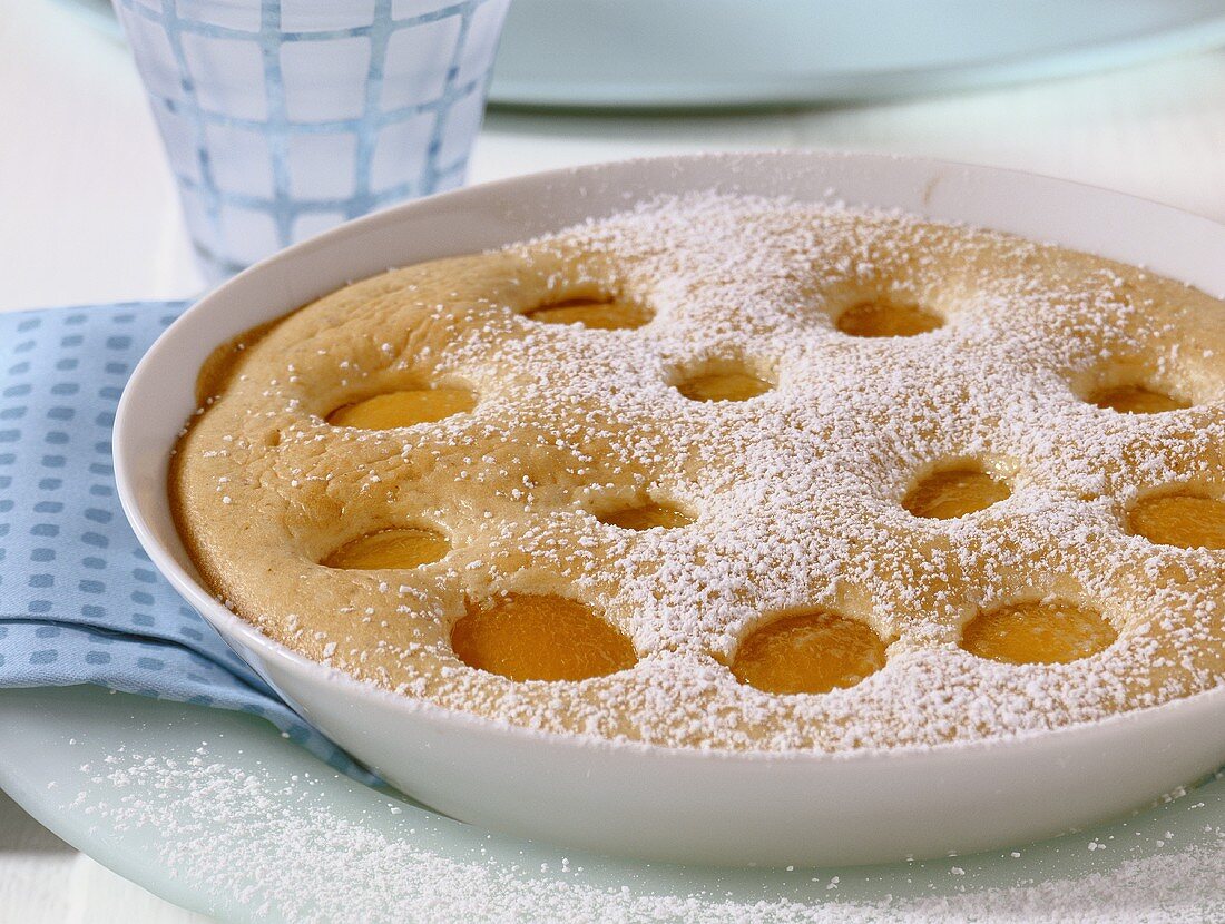 Apricot clafoutis with icing sugar