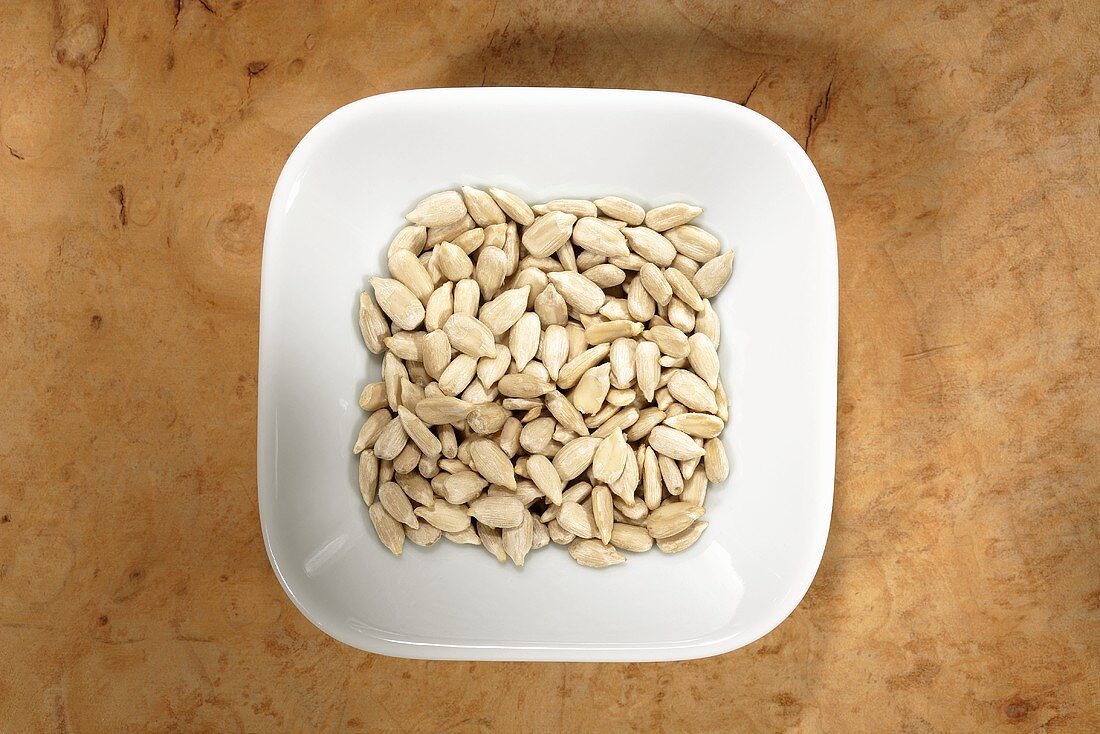 Sunflower seeds in dish from above