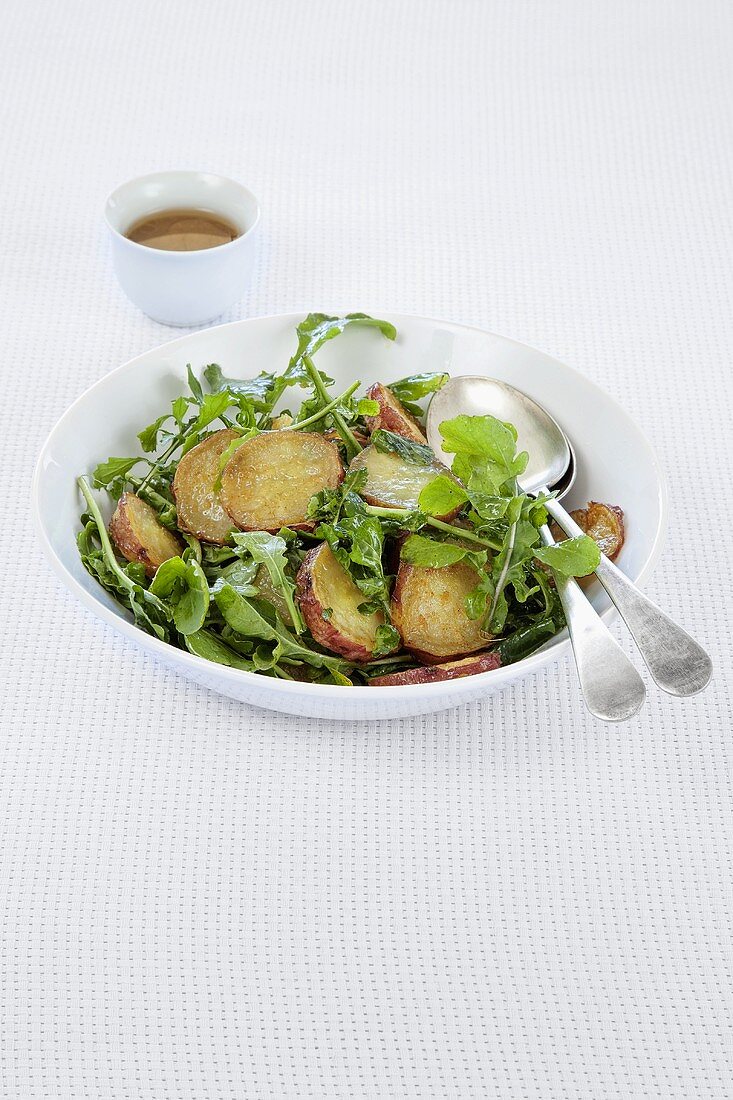 Sweet potato and rocket salad with honey and mustard dressing