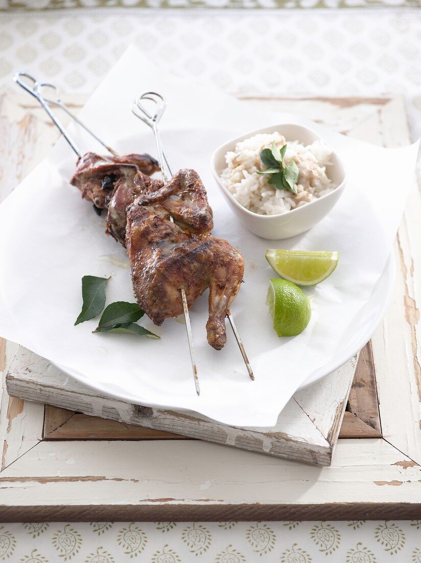 Chicken with green curry on skewer with rice