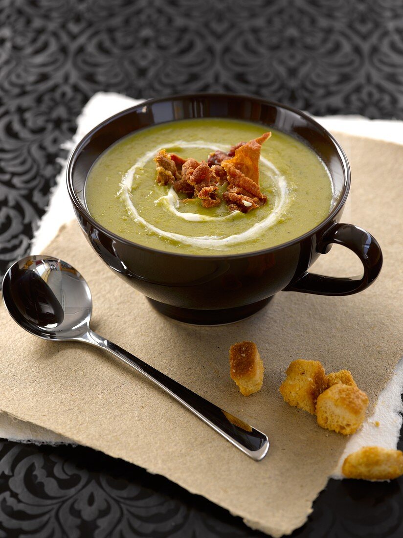 Cream of pea soup with fried Parma ham