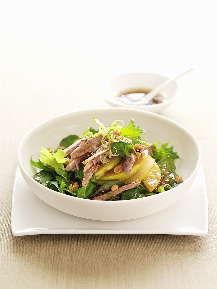Salad leaves with nashi pear and duck