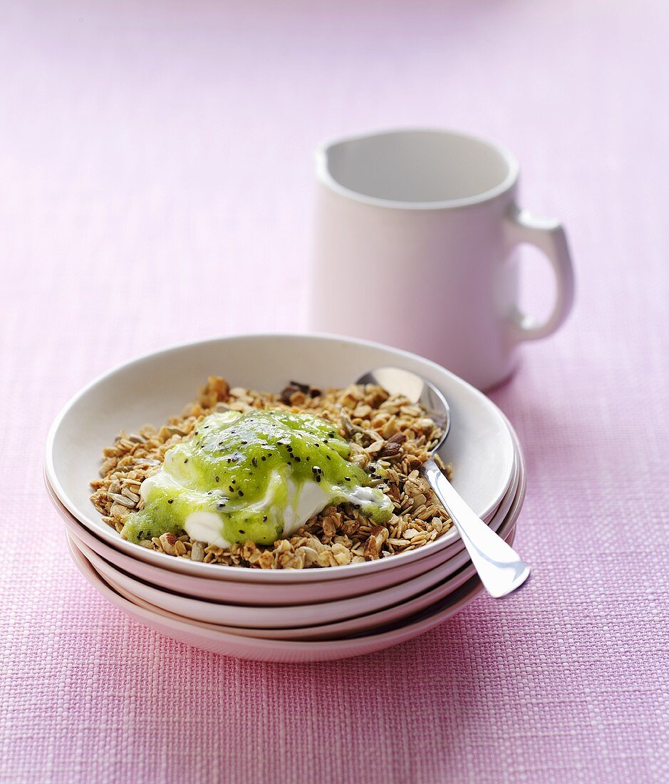 Muesli with yogurt and kiwi sauce