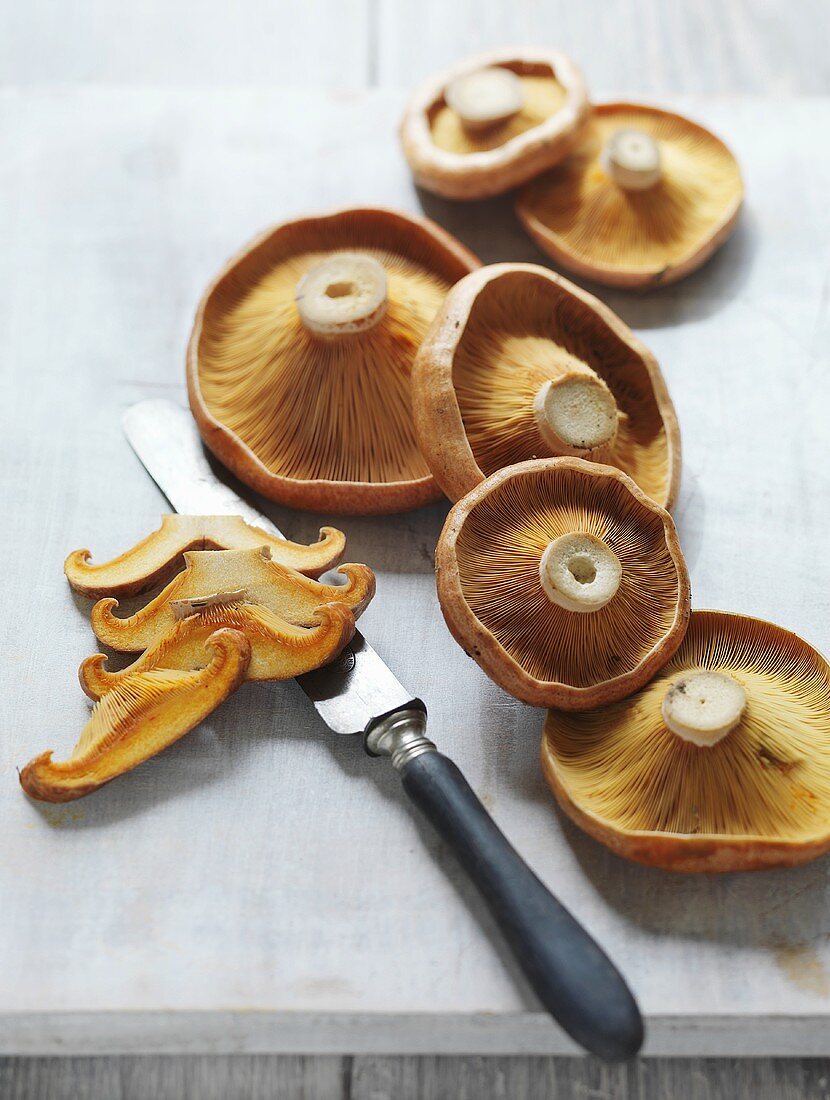 Matsutake mushrooms, one sliced