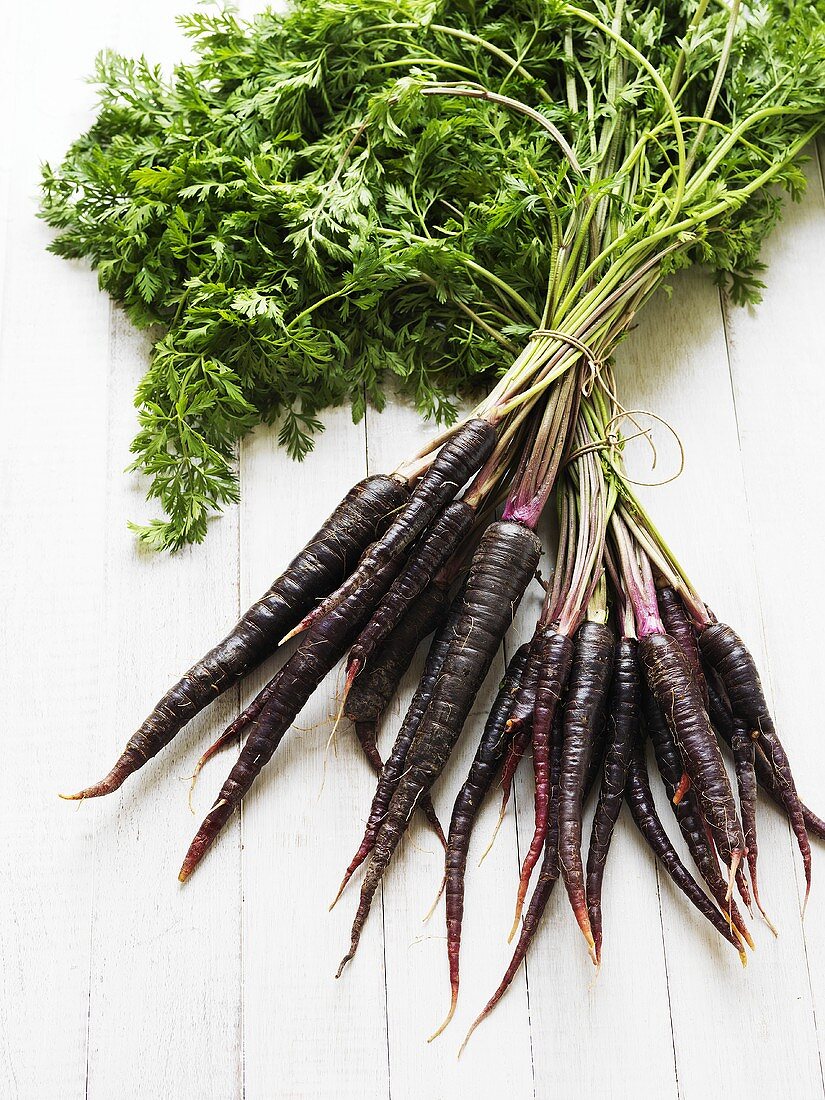 A bunch of purple carrots