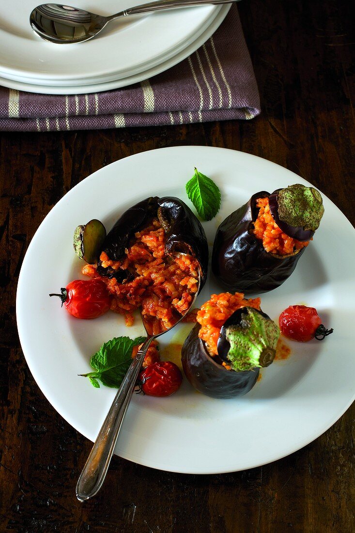Baby aubergines stuffed with tomato risotto