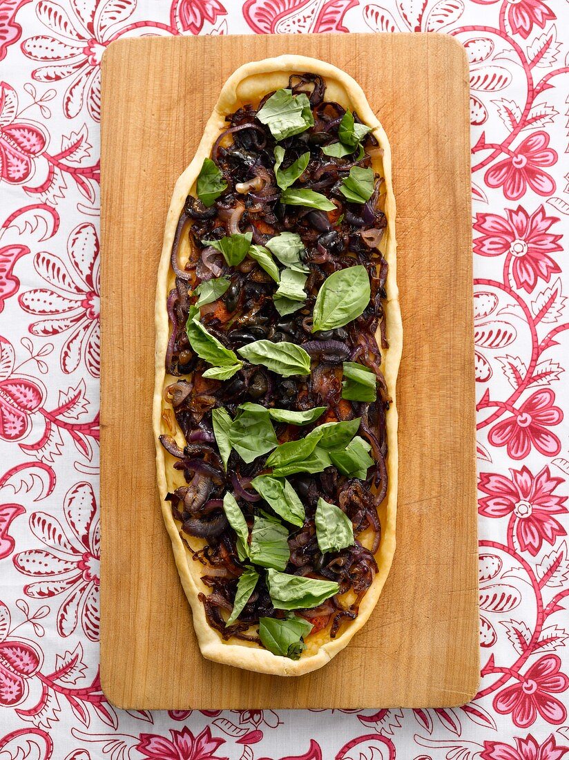 Flatbread topped with caramelised onions, chilli, chorizo and olives