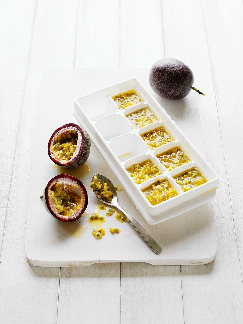 Passion fruit flesh in ice cube container